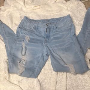 Light blue distressed jeans